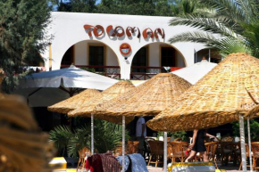 Отель Toloman Hotel & Apartments  Битез